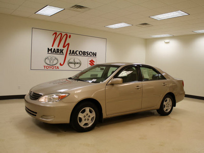 toyota camry 2003 tan sedan le v6 gasoline 6 cylinders front wheel drive automatic 27707