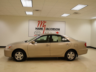 toyota camry 2003 tan sedan le v6 gasoline 6 cylinders front wheel drive automatic 27707