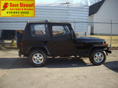 jeep wrangler 1993 black suv s gasoline 4 cylinders 4 wheel drive 5 speed manual 43560