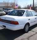 toyota corolla 1995 white sedan gasoline 4 cylinders front wheel drive 5 speed manual 80229