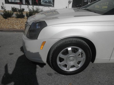 cadillac cts 2004 white sedan tan gasoline 6 cylinders rear wheel drive automatic 34731