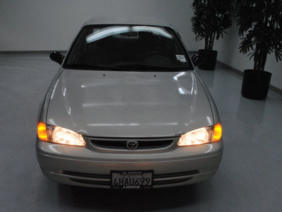 toyota corolla 1999 lt  brown sedan ce gasoline 4 cylinders front wheel drive automatic 91731