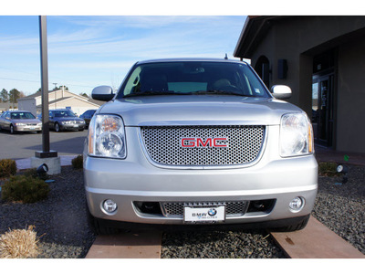 gmc yukon 2011 silver suv denali flex fuel 8 cylinders all whee drive automatic 99352