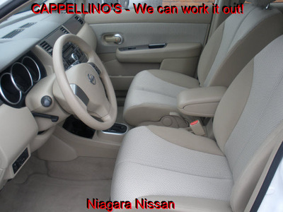 nissan versa 2009 white hatchback sl gasoline 4 cylinders front wheel drive automatic 14094