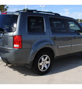 honda pilot 2009 gray suv touring w navi w dvd gasoline 6 cylinders all whee drive automatic with overdrive 77065