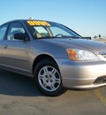 honda civic 2002 gldgold sedan lx gasoline 4 cylinders front wheel drive 4 speed automatic 90241