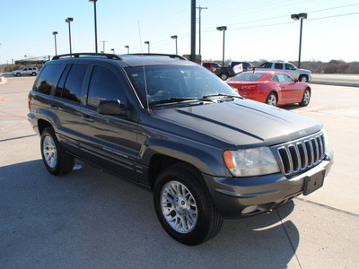 jeep grand cherokee 2002 gray suv limited gasoline 8 cylinders rear wheel drive automatic with overdrive 76087