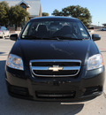 chevrolet aveo 2010 black sedan lt gasoline 4 cylinders front wheel drive automatic 76087