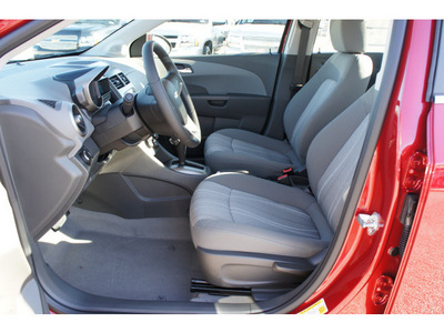chevrolet sonic 2012 red sedan lt gasoline 4 cylinders front wheel drive 6 spd auto 77090