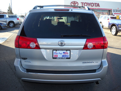 toyota sienna 2008 silver van gasoline 6 cylinders front wheel drive automatic 79925