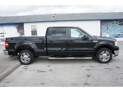 ford f 150 2007 black xlt gasoline 8 cylinders rear wheel drive 4 speed automatic 77388