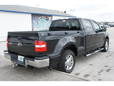 ford f 150 2007 black xlt gasoline 8 cylinders rear wheel drive 4 speed automatic 77388