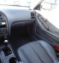 hyundai elantra 2003 silver hatchback gt gasoline 4 cylinders dohc front wheel drive 5 speed manual 60546