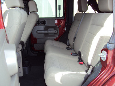 jeep wrangler 2007 red suv sahara gasoline 6 cylinders 4 wheel drive automatic 32901