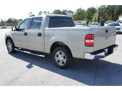 ford f 150 2007 gold xlt gasoline 8 cylinders rear wheel drive automatic 77388