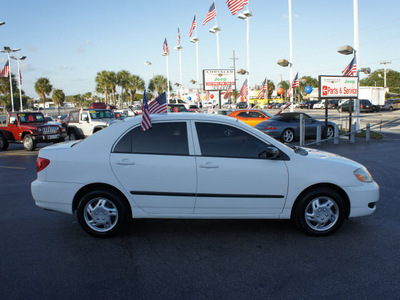 toyota corolla 2005 white sedan ce gasoline 4 cylinders front wheel drive automatic 33021