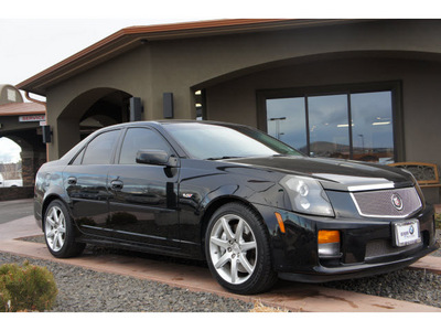 cadillac cts v 2005 black sedan gasoline 8 cylinders rear wheel drive 6 speed manual 99352