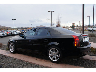 cadillac cts v 2005 black sedan gasoline 8 cylinders rear wheel drive 6 speed manual 99352