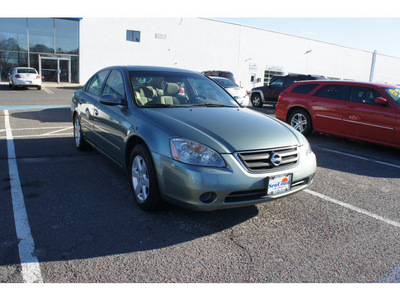 nissan altima 2002 dk  green sedan 2 5 s gasoline 4 cylinders front wheel drive automatic 07712