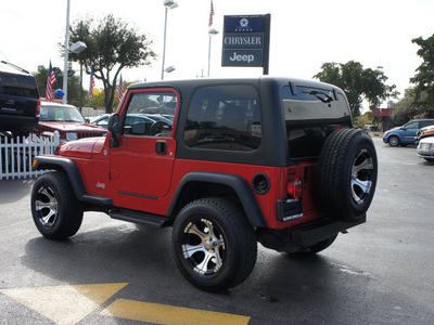 jeep wrangler 2006 red suv x gasoline 6 cylinders 4 wheel drive automatic 33021