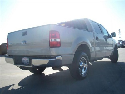 ford f 150 2007 gold xlt gasoline 8 cylinders rear wheel drive automatic 90241