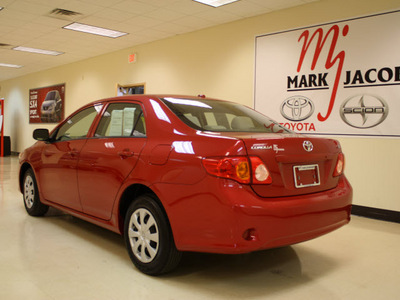 toyota corolla 2009 red sedan le gasoline 4 cylinders front wheel drive automatic 27707
