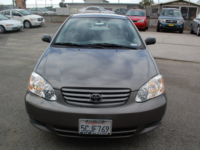 toyota corolla 2004 beige sedan le gasoline 4 cylinders front wheel drive automatic with overdrive 93955