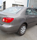 toyota corolla 2004 beige sedan le gasoline 4 cylinders front wheel drive automatic with overdrive 93955
