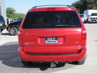 dodge caravan 2005 red van sxt gasoline 6 cylinders front wheel drive automatic 33884