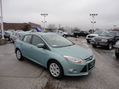 ford focus 2012 lt  blue sedan se gasoline 4 cylinders front wheel drive automatic with overdrive 60546