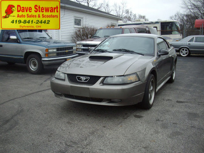 ford mustang 2002 tan coupe gt deluxe gasoline 8 cylinders rear wheel drive 5 speed manual 43560