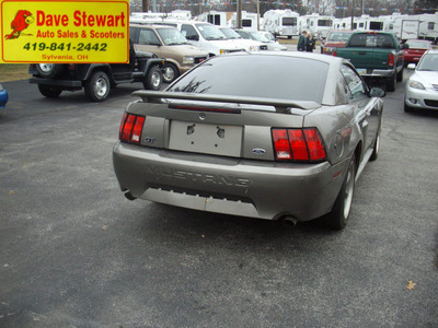 ford mustang 2002 tan coupe gt deluxe gasoline 8 cylinders rear wheel drive 5 speed manual 43560