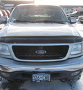ford f 150 2002 silver xlt fx4 gasoline 8 cylinders 4 wheel drive automatic with overdrive 55811