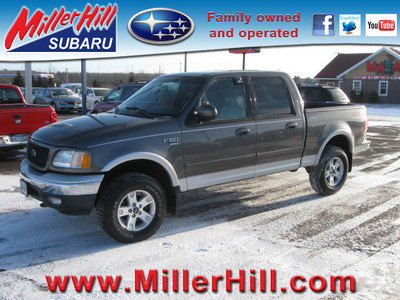ford f 150 2002 dk  gray lariat fx4 gasoline 8 cylinders 4 wheel drive automatic with overdrive 55811