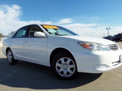 toyota camry 2002 white sedan le gasoline 4 cylinders front wheel drive automatic 90241