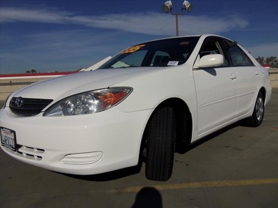 toyota camry 2002 white sedan le gasoline 4 cylinders front wheel drive automatic 90241