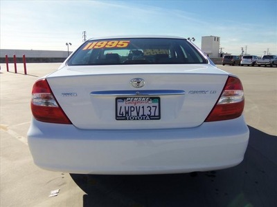 toyota camry 2002 white sedan le gasoline 4 cylinders front wheel drive automatic 90241