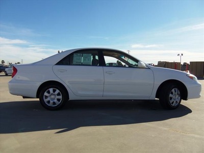 toyota camry 2002 white sedan le gasoline 4 cylinders front wheel drive automatic 90241