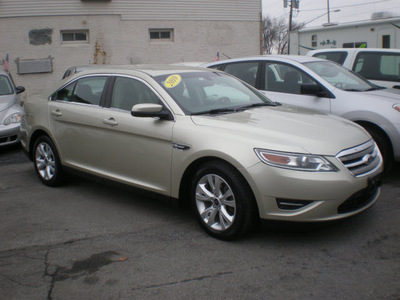 ford taurus 2010 gold sedan sel gasoline 6 cylinders front wheel drive automatic 13212