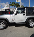 jeep wrangler 2004 silver suv sport gasoline 6 cylinders 4 wheel drive automatic 33157