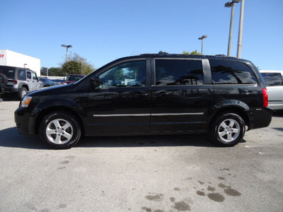 dodge grand caravan 2010 black van sxt gasoline 6 cylinders front wheel drive automatic 33157