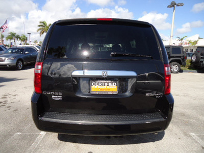 dodge grand caravan 2010 black van sxt gasoline 6 cylinders front wheel drive automatic 33157