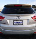 hyundai tucson 2011 silver gasoline 4 cylinders front wheel drive automatic 60007