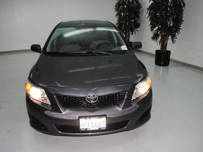 toyota corolla 2009 dk  gray sedan le gasoline 4 cylinders front wheel drive automatic 91731