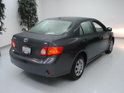 toyota corolla 2009 dk  gray sedan le gasoline 4 cylinders front wheel drive automatic 91731