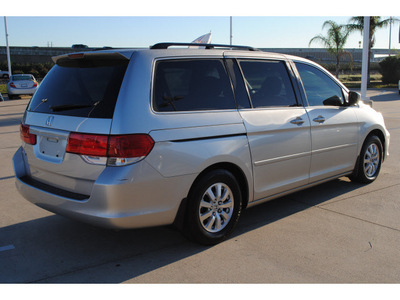 honda odyssey 2009 silver van ex gasoline 6 cylinders front wheel drive automatic with overdrive 77065