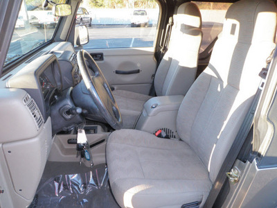 jeep wrangler 2003 beige suv rubicon gasoline 6 cylinders 4 wheel drive automatic 32401