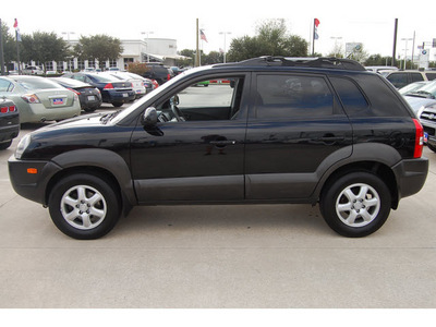 hyundai tucson 2007 black suv gasoline 6 cylinders front wheel drive shiftable automatic 77090