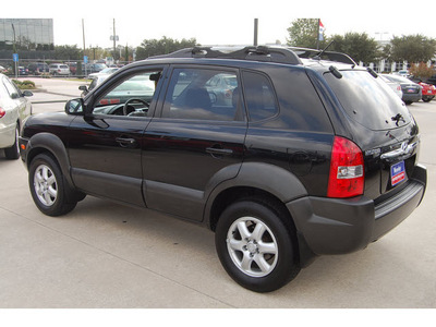 hyundai tucson 2007 black suv gasoline 6 cylinders front wheel drive shiftable automatic 77090