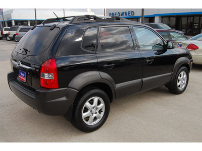 hyundai tucson 2007 black suv gasoline 6 cylinders front wheel drive shiftable automatic 77090